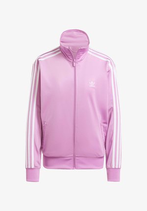 Giacca rosa con zip e alto colletto, strisce bianche sugli maniche e un piccolo logo bianco sul petto. Tessuto liscio e leggero.