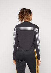 adidas Sportswear FUTURE ICONS THREE STRIPES LONG SLEEVE - Long sleeved top - black