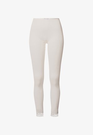 Off-white gerippte Leggings mit schmalem Bund und Spitzenbesatz am Knöchel, vor einem einfarbigen Hintergrund gezeigt.