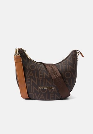 Brown Valentino shoulder bag with repeated brand name print, gold logo plaque, zipper closure, and adjustable dark brown strap.