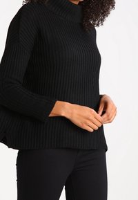 Zalando Essentials Strickpullover - black