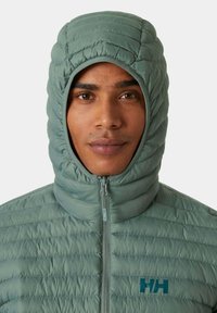 Helly Hansen SIRDAL HOODED INSULATOR - Chaqueta de invierno - grun