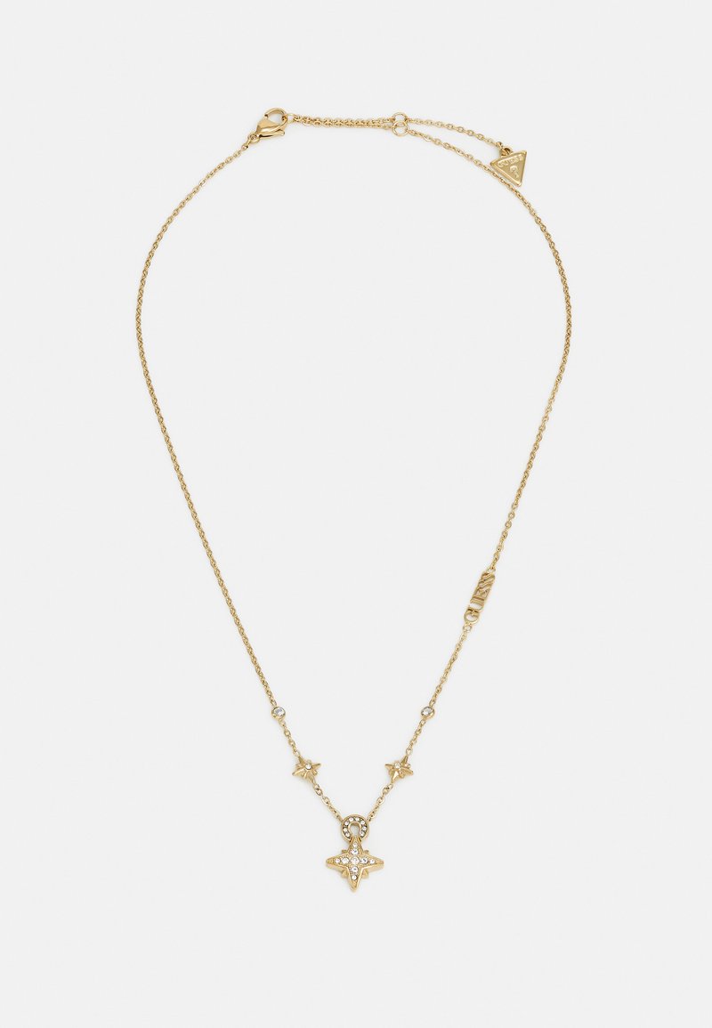 Collier en ton doré avec un pendentif en forme d'étoile orné de pierres transparentes, relié par une chaîne délicate avec de petits accents en forme d'étoile.