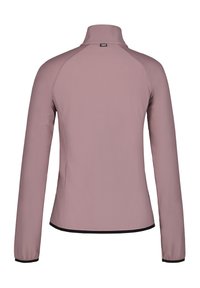 Rosa långärmad jacka med en mockkrage, slät textur, figurnära design och svarta detaljer vid ärmsluten och fållen.