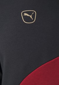 Puma KING CREW - Felpa - black/intense red