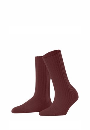 Rode geribbelde sokken met een gladde textuur, medium lengte en een zachte elastische bovenrand voor extra comfort en pasvorm.