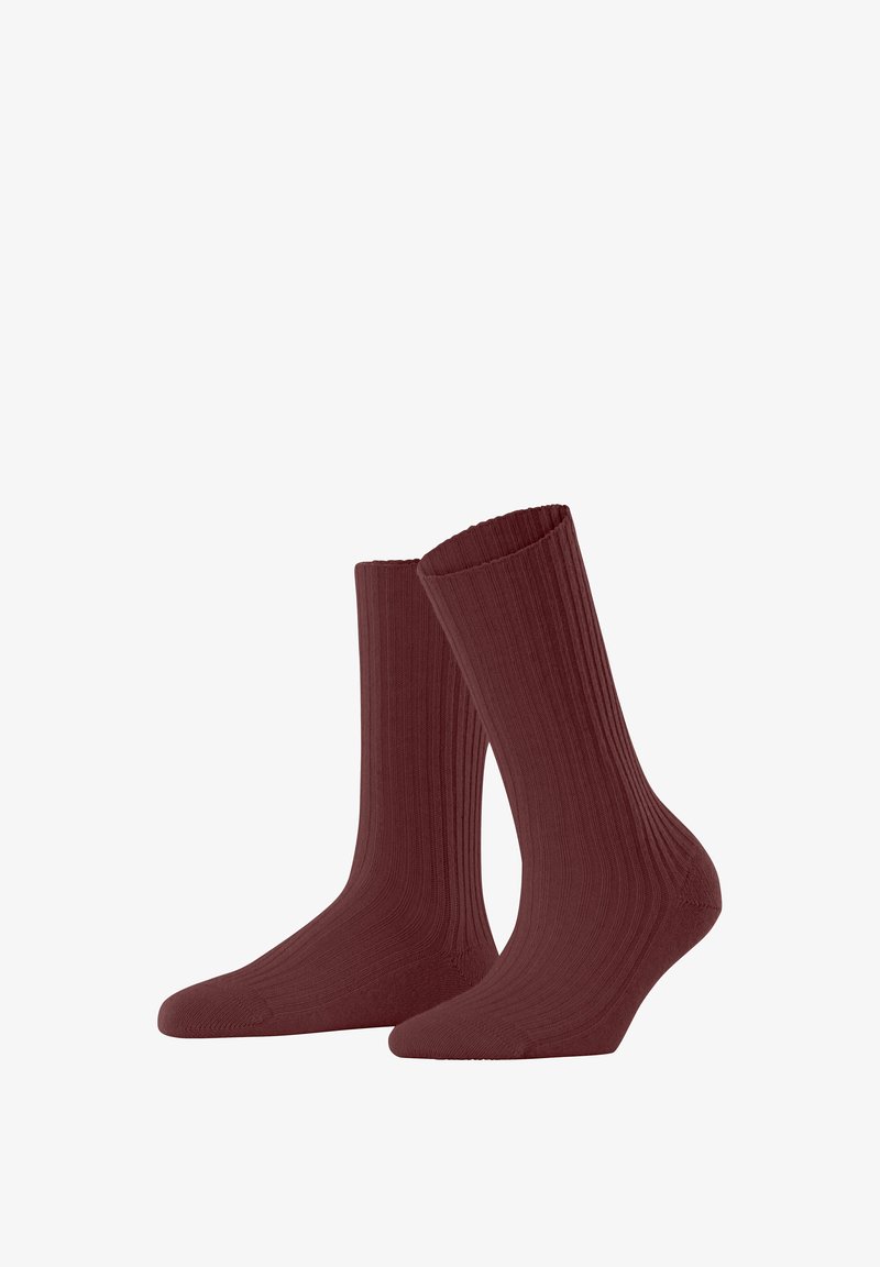 Calze rosse a coste con una texture liscia, di lunghezza media e una morbida elastica superiore per maggiore comfort e vestibilità.