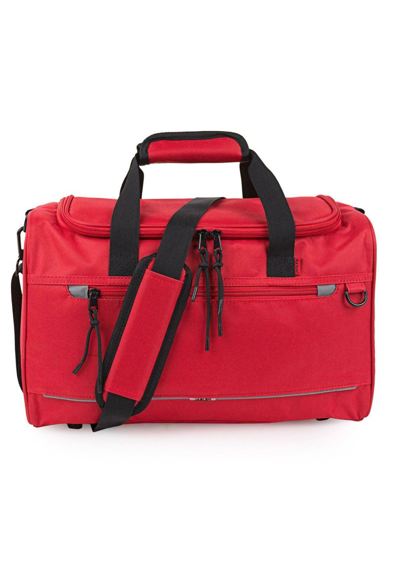 Bolso de viaje rojo hecho de un tejido duradero, que cuenta con dos asas superiores, una correa de hombro ajustable y múltiples bolsillos con cremallera.
