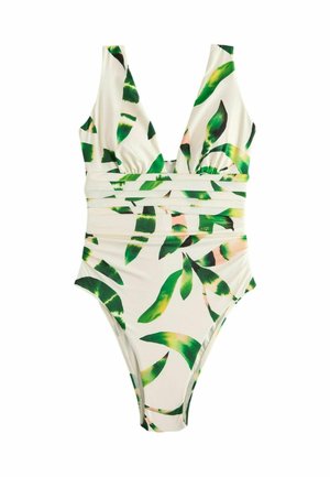 Weißer Einteiler mit grünen und gelben tropischen Blattmustern und tiefem V-Ausschnitt mit geraffter Taillendetailierung.