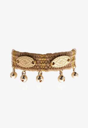 Braided beige fabric bracelet adorned with two oval gold accents and three dangling gold bells, featuring a textured surface and intricate patterns.