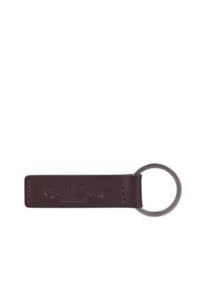 Dunkelbrauner Leder-Schlüsselanhänger mit Metallring und geprägtem Markennamen "Qualit Leder studio" auf dem Lederband.