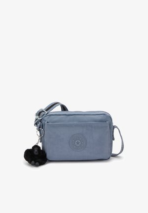 Jasnoniebieska torba crossbody z nylonu o teksturowym wykończeniu, z okrągłym logo, zamykanymi na zamek komorami oraz odpinanym breloczkiem w kształcie goryla.