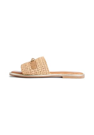 Flat slide sandal with woven beige strap and small metallic ornament on a tan sole with slight heel, shown from side.