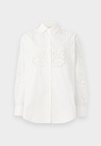 Seleccionado, bianco