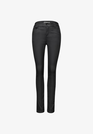 Black skinny jeans made of stretchy fabric. Features a standard waistband, zip fly, and two front pockets with subtle stitching details.