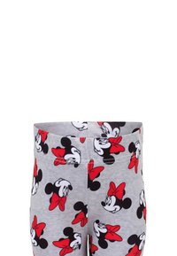 Szare legginsy z powtarzającym się wzorem twarzy Minnie Mouse z czerwonymi kokardkami. Materiał wygląda na elastyczny i miękki.