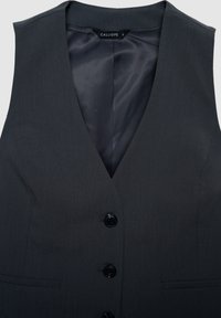 Gilet grigio con scollo a V, dotato di una texture liscia, sei bottoni neri e due tasche frontali. L'etichetta riporta "CALLIOPE" taglia S.