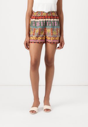 Shorts colorés à motifs avec une taille élastique, combinant des designs roses, jaunes, verts et orange. Fabriqués en tissu léger.