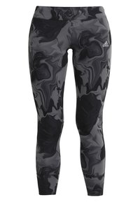 Black and grey marble-patterned leggings with a high waistband, made from a smooth, stretchy material. Features subtle logo detailing.