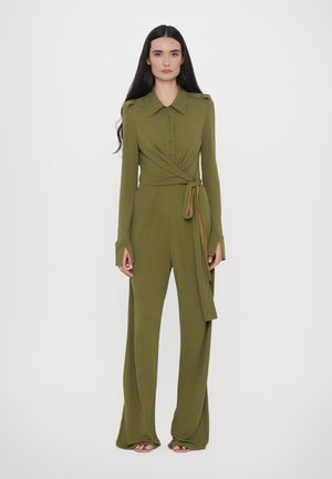 Olive green jumpsuit with a button-up front, wrap design, and wide-leg pants. Features a collar and tie detail at the waist.