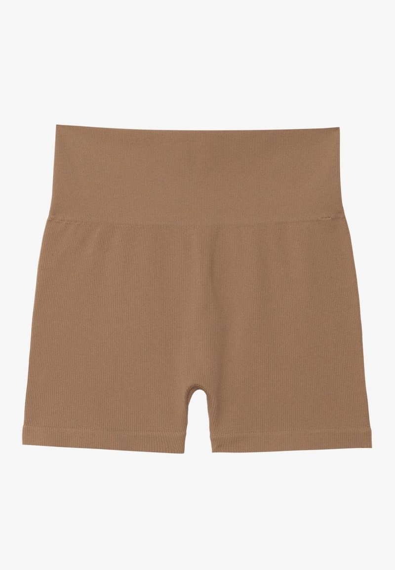Cuissard vélo beige taille haute sans coutures, avec une texture côtelée et une coupe à mi-cuisse.