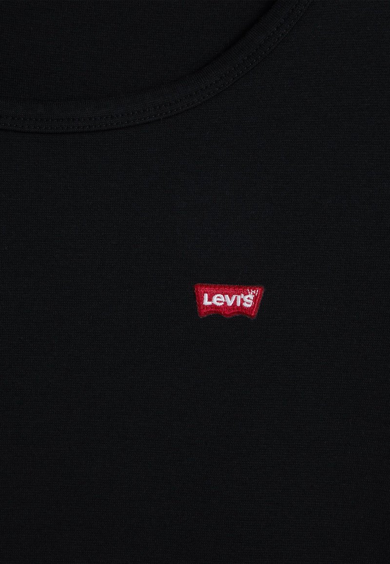 Camiseta sin mangas de algodón negra con un escote redondo y un pequeño logo bordado de Levi's en rojo centrado en el pecho. Textura suave y casual.