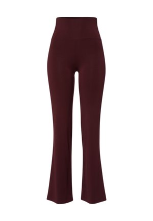 Leggings a vita alta e svasati di un profondo bordeaux, realizzati in tessuto elastico con una superficie liscia e un design pulito e minimalista.