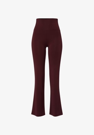Hochtaillierte, ausgestellte Leggings in tiefem Burgunderrot, aus dehnbarem Stoff mit glatter Textur und einem klaren, minimalistischen Design.
