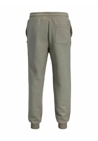 Hellgrüne Jogginghose aus weichem Material mit elastischem Bund, Seitentaschen und einer einzelnen Gesäßtasche, mit gerippten Bündchen.