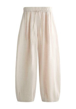Labave bež lanene hlače s elastičnim pojasom i vezicama, široke nogavice koje se blago sužavaju kod članaka, ležeran i udoban stil.