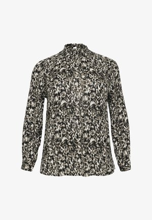 Pikemate mustvalge lilleline pluus pika varrukaga, koondatud kaelusega, voolava kangaga ja peene tekstuuriga. Omab mugavat lõiget ja nööpidega mansette.