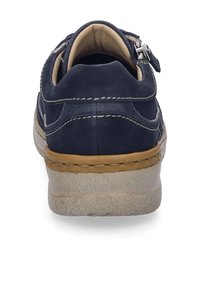 Marineblaue Lederschuhe mit beigen Akzenten. Sie verfügen über eine strukturierte Gummisohle, ein glattes Obermaterial und sichtbare Nähte an den Seiten.