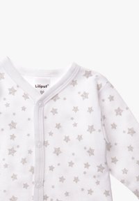 White baby bodysuit with gray star pattern, soft fabric, v-neckline, and snap-button closure at the front. Brand label visible.