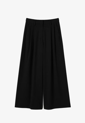 Pantalon noir à jambes larges avec taille haute, plis nets, tissu texturé lisse et poches latérales.