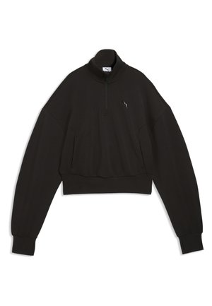 Zwarte cropped trui met lange mouwen, halve ritssluiting, hoge kraag en klein Puma-logo op de linkerborst.
