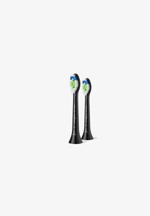 Zwarte elektrische tandenborstelkoppen met afgeronde vormen, met groene, blauwe en witte borstelharen, gelabeld "Philips Sonicare."