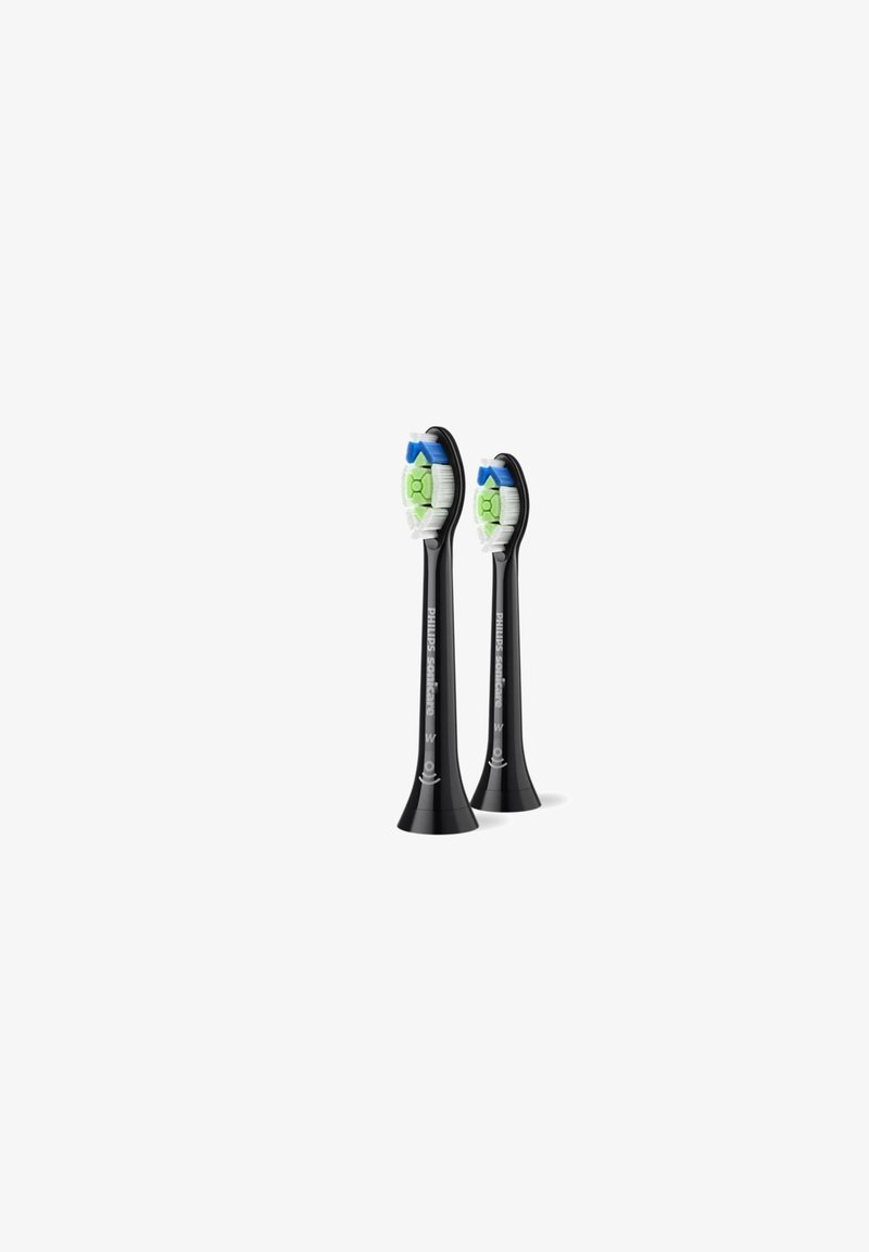 Têtes de brosse à dents électriques noires à formes arrondies, avec des poils verts, bleus et blancs, étiquetées "Philips Sonicare".