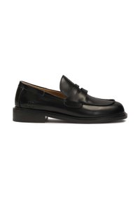 Black leather loafer with a rounded toe, decorative upper strap, and low stacked heel. Smooth texture and minimal stitching details.
