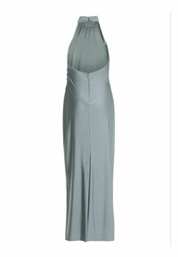 Robe à col licou en tissu doux vert clair. Elle présente un dos décolleté et une silhouette ajustée, avec une texture lisse et extensible. Fermeture éclair au dos.