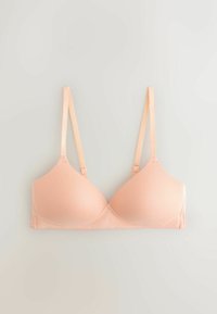 Lys pink formstøbt bh med justerbare tynde stropper, glat stof og uden synlige udsmykninger mod en neutral baggrund.