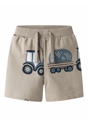 Beige katoenen shorts met elastische tailleband, voorzien van blauwe tractor- en wagenafbeeldingen. Lichtgewicht en zachte textuur, geschikt voor casual gebruik.