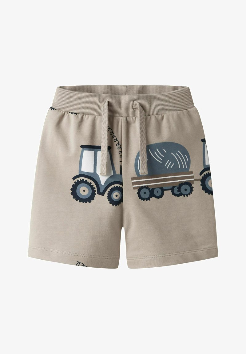 Beige katoenen shorts met elastische tailleband, voorzien van blauwe tractor- en wagenafbeeldingen. Lichtgewicht en zachte textuur, geschikt voor casual gebruik.