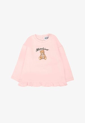 Maglietta a maniche lunghe rosa con grafica di orsetto e testo "Moschino". L'orlo è decorato con un dettaglio arricciato.
