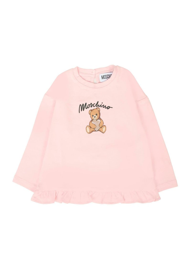 Maglietta a maniche lunghe rosa con grafica di orsetto e testo "Moschino". L'orlo è decorato con un dettaglio arricciato.