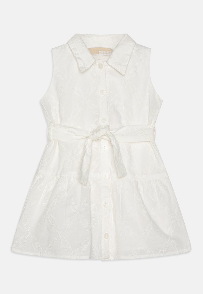 Sleeveless white dress with a collared neckline, button-down front, and a belt at the waist. Features textured embroidery on fabric.