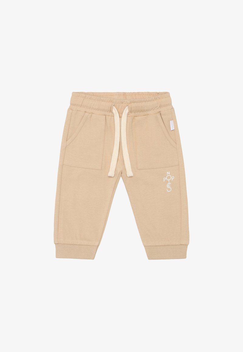 Pantalon de survêtement beige pour tout-petit avec taille élastique, cordon blanc, poches avant, poignets côtelés et logo blanc "Noppies" sur la jambe gauche.