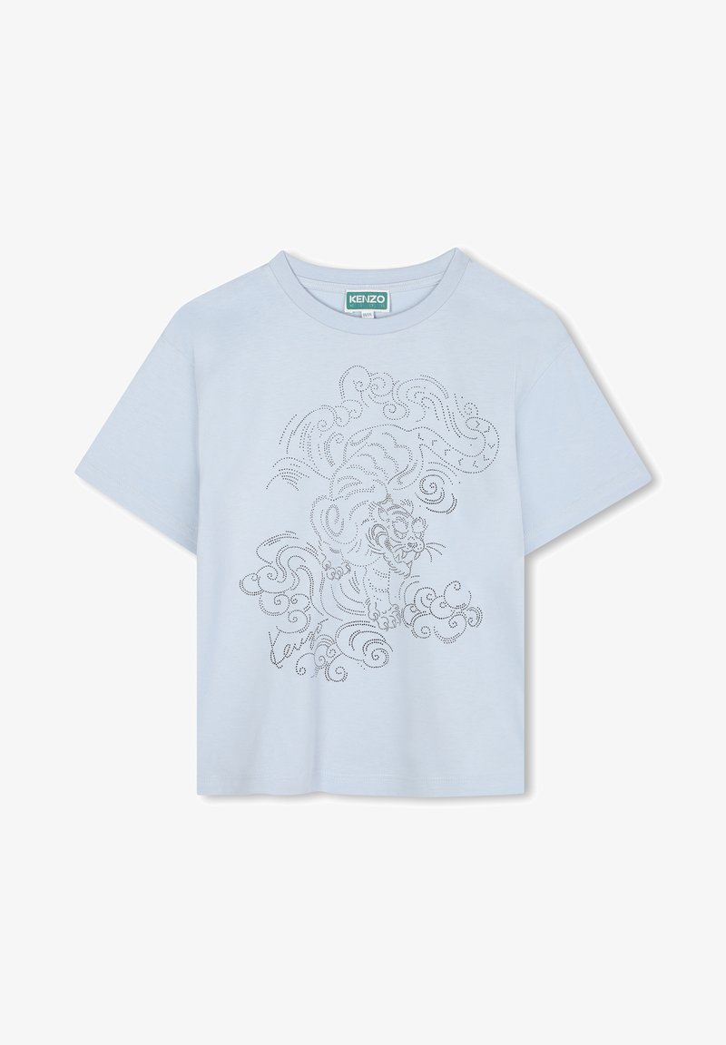 T-shirt en coton bleu clair à manches courtes et col rond. Présente un graphisme d'un tigre et des nuages tourbillonnants dans un design gris à pois.