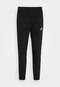 Pantalones de chándal negros de Nike con un ajuste relajado, cinturilla elástica, tobillos ajustados y un pequeño logo blanco en el muslo izquierdo. Hechos de tejido suave.