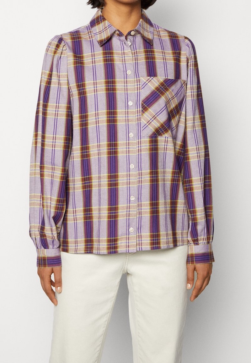 Purple plaid shirt with long sleeves, a button-up front, and a single chest pocket. Features light and dark stripes in yellow and brown.