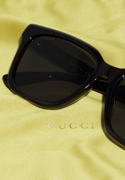 gafas gucci marrones
